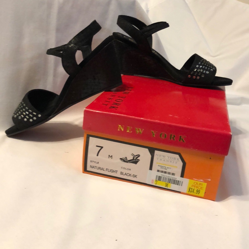 New York Transit Sz 7M 2.75” heels with open toe.